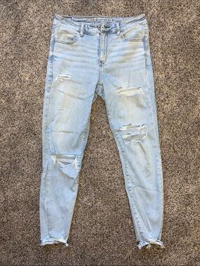 American Eagle Outfitters Light Wash Ripped High-Rise Jegging